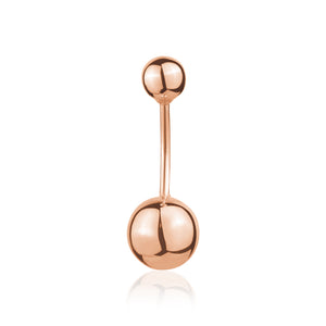 Top-view of 14k rose gold navel ring with single bead Top-view of 14k rose gold navel ring with single bead