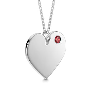 Sterling silver heart pendant necklace with red simulated birthstone, angled view